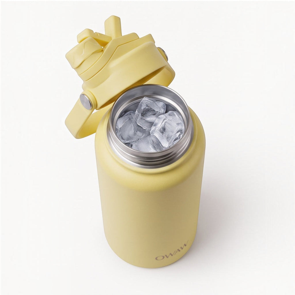 OWAW Nomade 32oz water bottle in Citrus, lifestyle shot