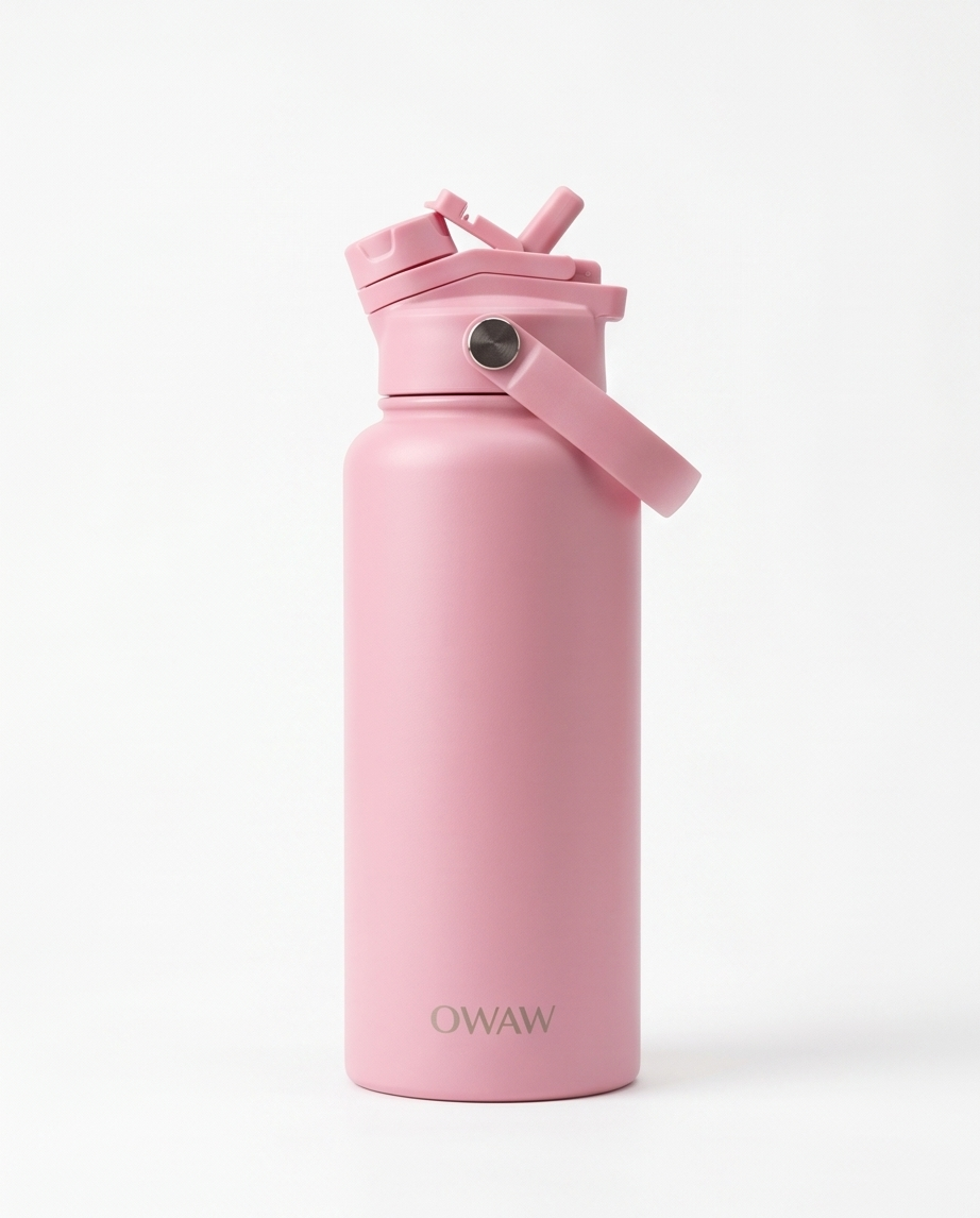 Gourde OWAW de 32 oz rose avec paille intégrée, design minimaliste et finition élégante pour un usage quotidien.