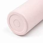 Base of the OWAW Nomade 32 oz sports water bottle in Blush Pink, textured powder-coated finish
