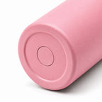 Base of the OWAW Nomade 32 oz sports water bottle in Pink, textured powder-coated finish
