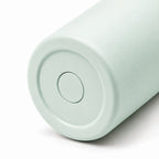 Base of the OWAW Nomade 32 oz sports water bottle in Soft Mint, textured powder-coated finish